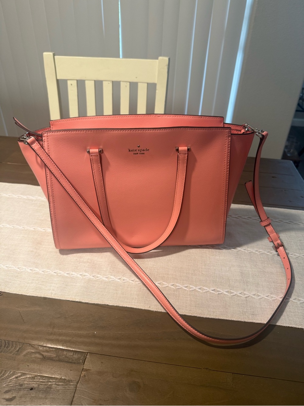 Kate Spade shoulder bag with crossbody strap.